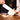 Professional chef using SKWARE 9 inch chef's knife for slicing vegetables